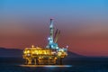 Offshore oil platform at dusk Royalty Free Stock Photo