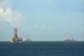 Offshore oil rig and drilling vessels in Chaguaramas Bay, Trinidad and Tobago working on oil industry project.