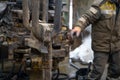 Offshore oil rig worker prepare tool and equipment for perforation oil and gas well at wellhead platform. Making up a drill pipe