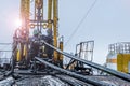 Offshore oil rig worker prepare tool and equipment for perforation oil and gas well at wellhead platform. Making up a drill pipe