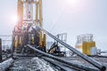 Offshore oil rig worker prepare tool and equipment for perforation oil and gas well at wellhead platform. Making up a drill pipe