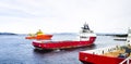 Offshore ships in Norwegian fiords arriving for resupply and ref Royalty Free Stock Photo