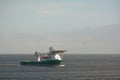 Offshore supply and diving support vessel working on a oil industry project at sea. Royalty Free Stock Photo