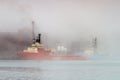 Offshore supply vessel on foggy day