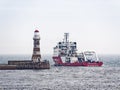 Offshore support and survey vessel Geo Ocean 111 leaves the river Wear at Roker, Sunderland, UK