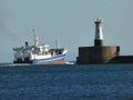 Offshore vessel leaving port in Aberdeen, Scotland