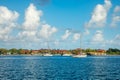 Offshore view of Rodney bay with yachts anchored in the lagoon and rich resorts in the background, Saint Lucia, Caribbean sea