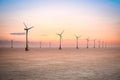 Offshore wind farm in sunset Royalty Free Stock Photo