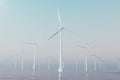 Offshore wind farm turbines caught in sunset sky. Beautiful contrast with the blue sea. ecological concept. 3d rendering Royalty Free Stock Photo
