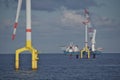 Offshore wind turbine installation with crane Royalty Free Stock Photo