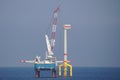 Offshore wind turbine installation with crane Royalty Free Stock Photo