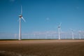 Offshore Windmill farm in the ocean Westermeerwind park , windmills isolated at sea on a beautiful bright day Royalty Free Stock Photo