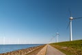 Offshore Windmill farm in the ocean Westermeerwind park , windmills isolated at sea on a beautiful bright day