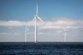 Offshore Windmill farm in the ocean Westermeerwind park , windmills isolated at sea on a beautiful bright day Royalty Free Stock Photo