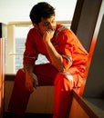 Offshore worker resting at bridge Royalty Free Stock Photo