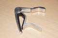 Crushers or `capo` - Small accessory for stringed instruments Royalty Free Stock Photo