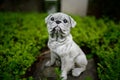 Dog figure bravely guarding a grave