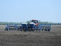 Case 315 tractor pulling a Kinze pivot fold 16 row planter Royalty Free Stock Photo