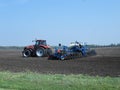 Case 315 tractor pulling a Kinze pivot fold 16 row planter Royalty Free Stock Photo
