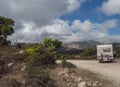 Ogliastra, Sardinia, Italy, September 11, 2020: Camper van standing at country dirt road at Supramonte Mountains with