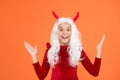 Oh my god. surprised child in devil horns. kid has long white hair wig. childhood happiness. teen girl ready to Royalty Free Stock Photo
