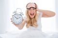 Oh no I late. Photo of crazy shocked fear lady sitting bed sheets holding metal alarm clock morning missed work Royalty Free Stock Photo