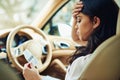 Oh no not a parking ticket. an attractive young woman annoyed that she got a traffic ticket. Royalty Free Stock Photo