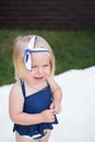 Oh no. Unhappy girl child with blond hair. Small girl crying outdoor. Small child wear stylish headband in hair. Hair