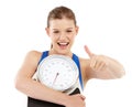 Oh yeah All that healthy eating and exercise worked. Close-up studio portrait of a pretty teenage girl carrying a scale Royalty Free Stock Photo