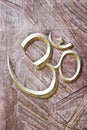 Ohm sign on a wood background