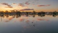 Ohmas Bay Sunset with Clouds, Pelicans and Reflections