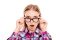 Oho! Shocked pretty woman touching her glasses Royalty Free Stock Photo