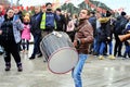 OHRID, MACEDONIA - JANUARY 19, 2019: Musician playing drum instrument during the celebration of Epiphany day in Ohrid, Macedonia