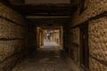OHRID, NORTH MACEDONIA: Passageway for people and cars in the form of a tunnel inside an old house on a street Royalty Free Stock Photo