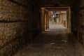 OHRID, NORTH MACEDONIA: Passageway for people and cars in the form of a tunnel inside an old house on a street Royalty Free Stock Photo