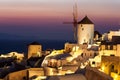 Oia at dusk, with beautiful windmill, Santorini island, Greece Royalty Free Stock Photo