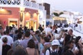 Oia, Santorini, GREECE - June 9, 2017:A CROWD OF TOURISTS AWAITS THE FAMOUS SANTORINI SUNSET