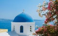 Oia Santorini Greece on a sunny day during summer with whitewashed homes and churches, Greek Island Royalty Free Stock Photo