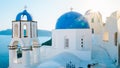 Oia Santorini Greece on a sunny day during summer with whitewashed homes and churches, Greek Island Royalty Free Stock Photo