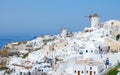 Oia Santorini Greece on a sunny day during summer with whitewashed homes and churches, Greek Island Royalty Free Stock Photo