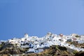 Oia santorini town built into volcanic cliffs