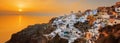 Oia at sunset, panoramic view Royalty Free Stock Photo