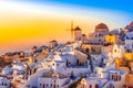 Oia town, Santorini island, Greece at sunset. Traditional and fa