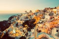 Oia town on Santorini island, Greece at sunset Royalty Free Stock Photo