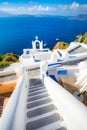 Oia town on Santorini island, Greece. Traditional and famous houses and churches with blue domes over the Caldera, Aegean sea Royalty Free Stock Photo