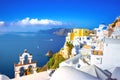 Oia town on Santorini island, Greece. Traditional and famous houses and churches with blue domes over the Caldera, Aegean sea Royalty Free Stock Photo