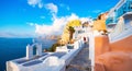 Oia town on Santorini island, Greece. Traditional and famous houses and churches with blue domes over the Caldera. Royalty Free Stock Photo