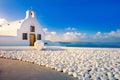 Oia town on Santorini island, Greece. Traditional and famous houses and churches with blue domes over the Caldera.