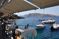 Oia, view from the coast of Port Amoudi. Santorini island, Greece. Royalty Free Stock Photo