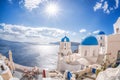 Oia village with churches against azure sea on Santorini island in Greece Royalty Free Stock Photo